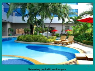 Swimming pool with sunloungers   