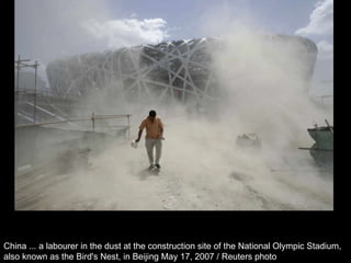 China ... a labourer in the dust at the construction site of the National Olympic Stadium,  also known as the Bird's Nest, in Beijing May 17, 2007 / Reuters photo  