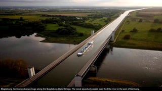 Magdeburg, Germany A barge chugs along the Magdeburg Water Bridge. The canal aqueduct passes over the Elbe river in the east of Germany.
 