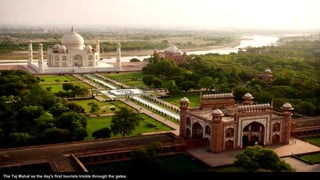 The Taj Mahal as the day's first tourists trickle through the gates.
 