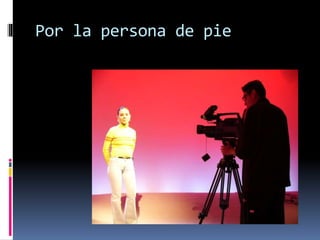 Por la persona de pie
 