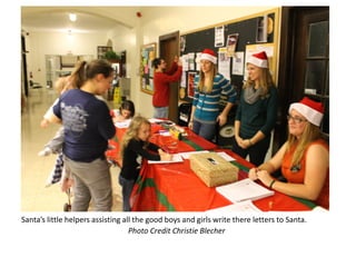 Santa’s little helpers assisting all the good boys and girls write there letters to Santa.
                                   Photo Credit Christie Blecher
 