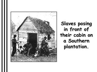 Slaves posing in front of their cabin on a Southern plantation. 