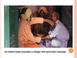 76
An Indian healer provides a villager with ayurvedic massage
 