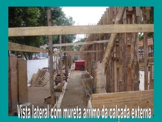 Vista lateral com mureta arrimo da calçada externa 