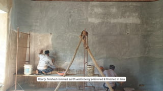 Poorly finished rammed earth walls being plastered & finished in lime
 