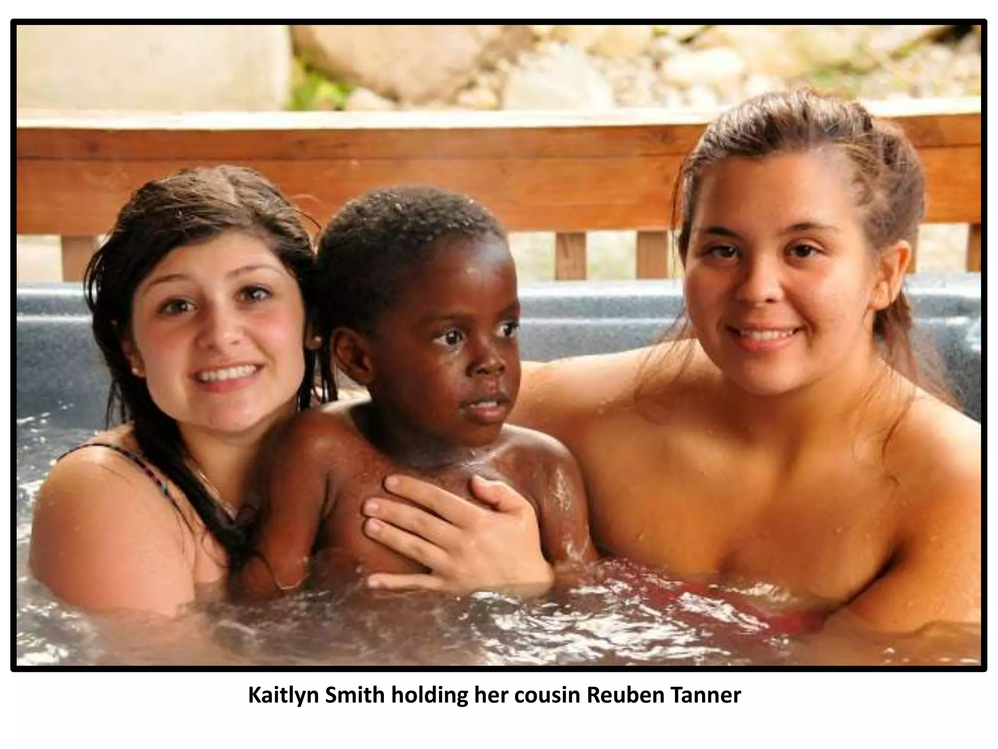 Kaitlyn Smith holding her cousin Reuben Tanner
 