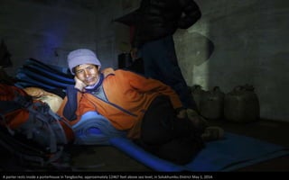 A porter rests inside a porterhouse in Tengboche, approximately 12467 feet above sea level, in Solukhumbu District May 1, 2014.
 