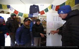 Trekkers have their oxygen level checked at the Himalayan Rescue Association Nepal post in Pheriche, approximately 14107 feet above sea level, in Solukhumbu District May
3, 2014.
 