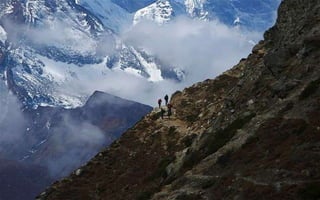 Mount Ama Dablam, which stands approximately 22310 feet above sea level, is seen behind Khumjung Village in Solukhumbu Dis...