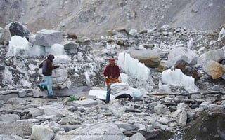 Phurba Tenzing Sherpa, 24, who has reached the summit of Everest nine times, sits inside his tent at Everest Base camp, ap...