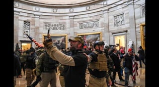 The mob enters the Capitol’s rotunda. Saul Loeb/AFP/Getty Images
 