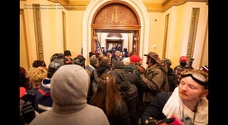 The pro-Trump mob outside the door to the House chamber
after breaching Capitol security. Jim Lo Scalzo/EPA
 