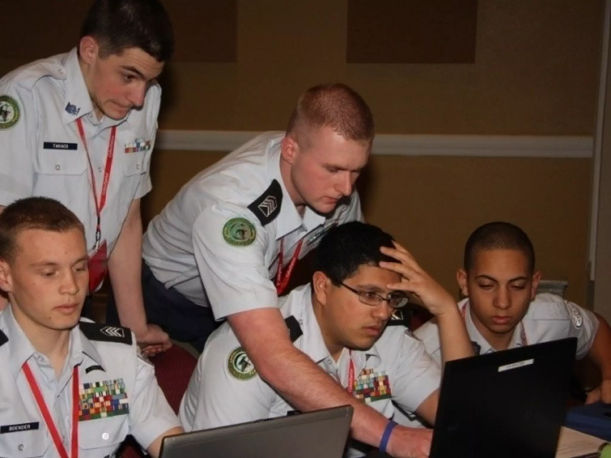 How CyberPatriot works
• Multi-round competition
– Qualifying rounds are virtual and teams
compete simultaneously
– Teams download VMware images and attempt
to secure them over a given period of time
– Teams connected to centralized scoring
platform
– Teams graded against known solution sets
• Finals held in Orlando and
Washington DC
 