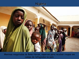 NigériaNigéria
Meninas resgatadas do Boko Haram, esperam para receber roupas em
campo de refugiados no país.
 