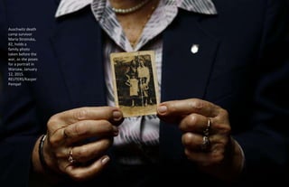 Auschwitz death camp survivor Lajos
Erdelyi, 87, holds a drawing made by a
campmate as he poses for a portrait in
Budapest...
