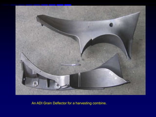 An ADI Grain Deflector for a harvesting combine.
 