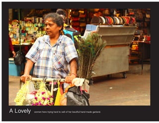 A Lovely women here trying hard to sell of her beutiful hand made garland.
 
