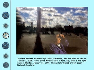 A woman watches as Marine Cpl. Brett Lundstrom, who was killed in Iraq on January 7, 2006, leaves Little Wound School in Kyle, SD, after a two night wake on Monday, January 16, 2006. He was later buried at Fort Logan National Cemetery. 