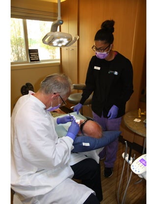 Bainbridge Island dentist Dr. Verharen fixing a dental crown at Current Dental