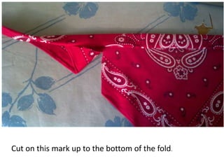 Cut on this mark up to the bottom of the fold.
 