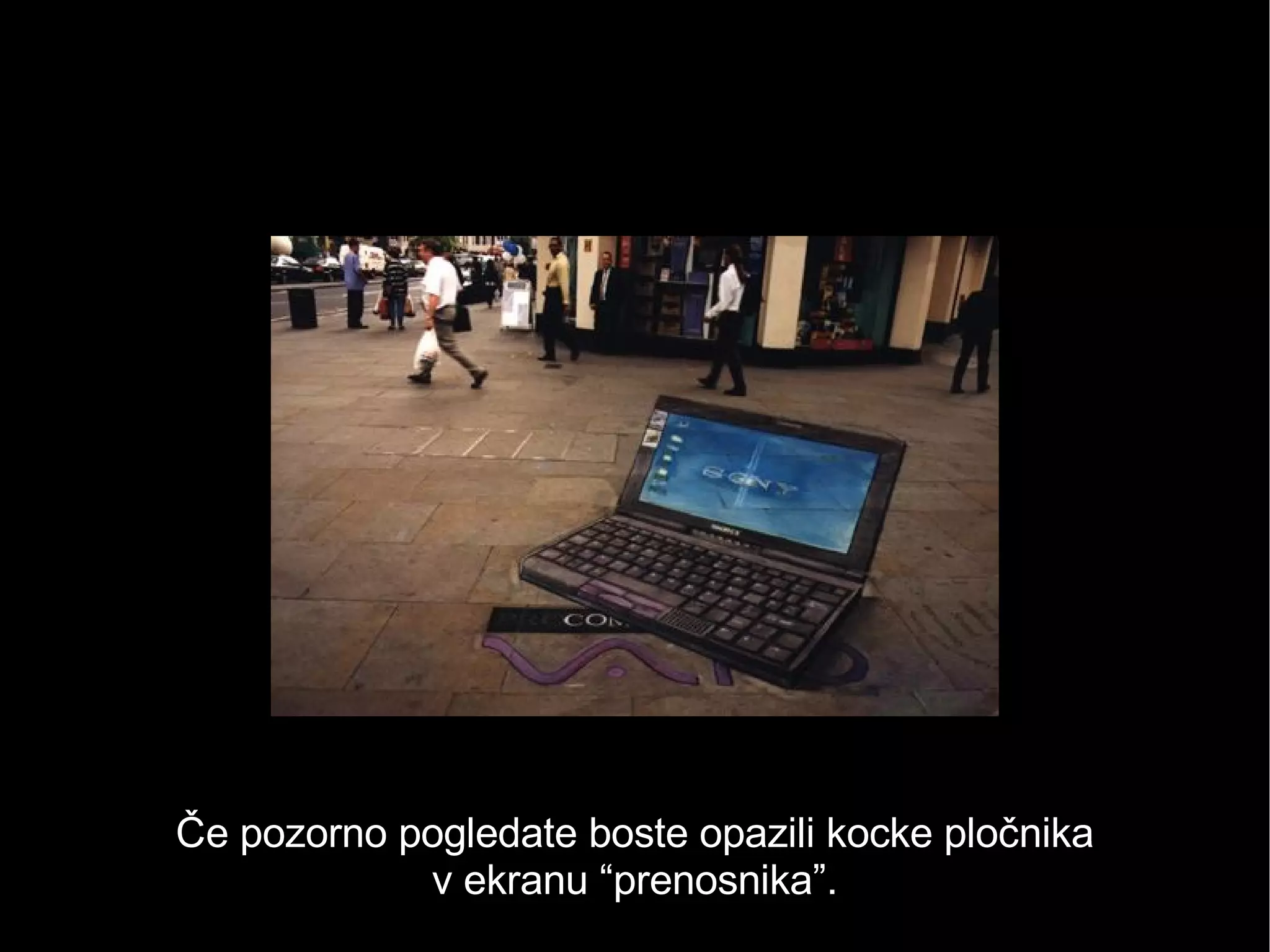 Če pozorno pogledate boste opazili kocke pločnika v ekranu “prenosnika”. 