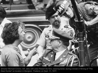 Director Michael Cimino, left, talks with actor Robert De Niro, wearing beret, during a break in filming of "The
Deer Hunt...