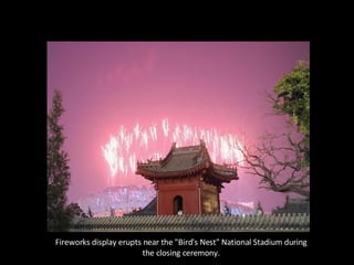 Fireworks display erupts near the "Bird's Nest" National Stadium during the closing ceremony. 