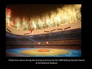 Performers dance during the closing ceremony for the 2008 Beijing Olympic Games at the National Stadium. 