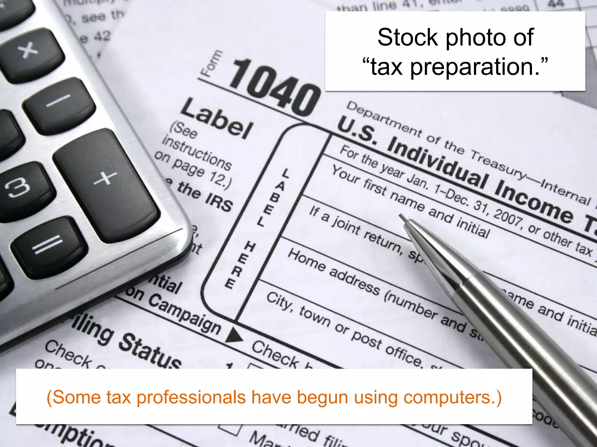 Stock photo of
“tax preparation.”
(Some tax professionals have begun using computers.)
 