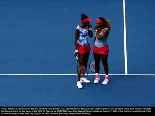 Serena W illiams of the United States serves to Ekaterina M akarova of Russia during their women's singles semifinal match...