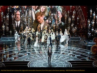 Host Neil Patrick Harris shares the stage with memorable characters from films past in the Oscars opening. MIKE BLAKE/News...
