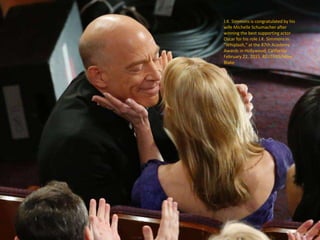 J.K. Simmons is congratulated by his
wife Michelle Schumacher after
winning the best supporting actor
Oscar for his role J...