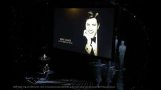 Eddie Vedder sings an In Memoriam tribute to recently deceased entertainers as the screen shows actor Jerry Lewis. REUTERS...