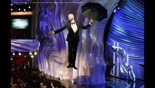Keegan Michael Key drops down to announce the Mary Poppins performance. REUTERS/Mike Blake
 