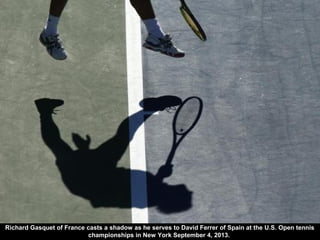 Richard Gasquet of France casts a shadow as he serves to David Ferrer of Spain at the U.S. Open tennis
championships in New York September 4, 2013.
 