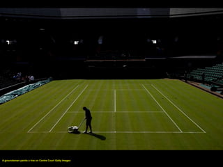 A groundsman paints a line on Centre Court Getty Images
 