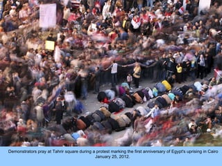Demonstrators pray at Tahrir square during a protest marking the first anniversary of Egypt's uprising in Cairo January 25...