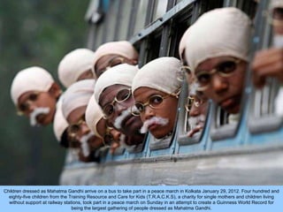 Children dressed as Mahatma Gandhi arrive on a bus to take part in a peace march in Kolkata January 29, 2012. Four hundred...