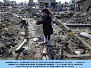 Wakana Kumagai, 7, visits the spot where her house, which was washed away by the March 11, 2011 tsunami,
   used to stand ...
