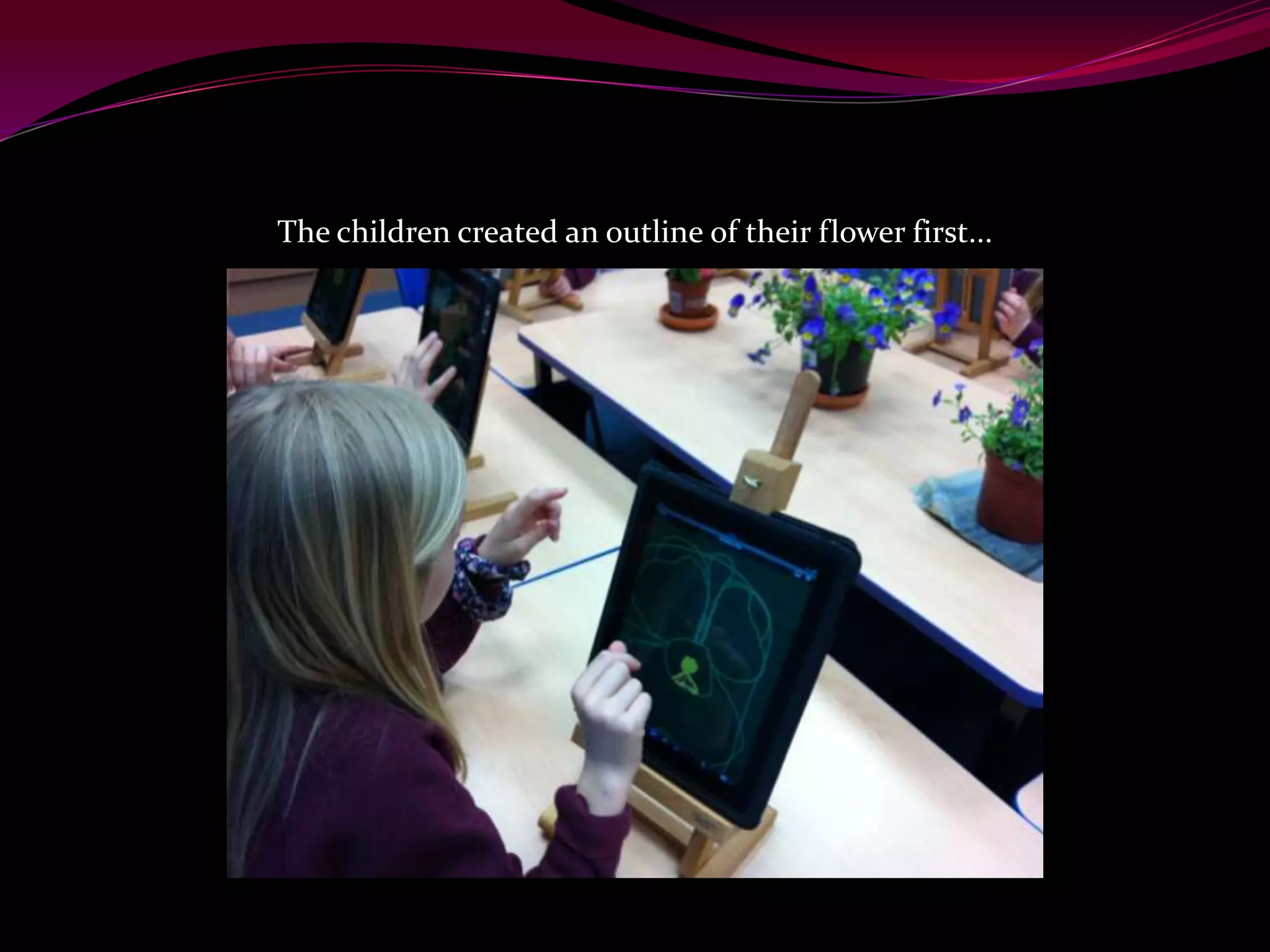 The children created an outline of their flower first...