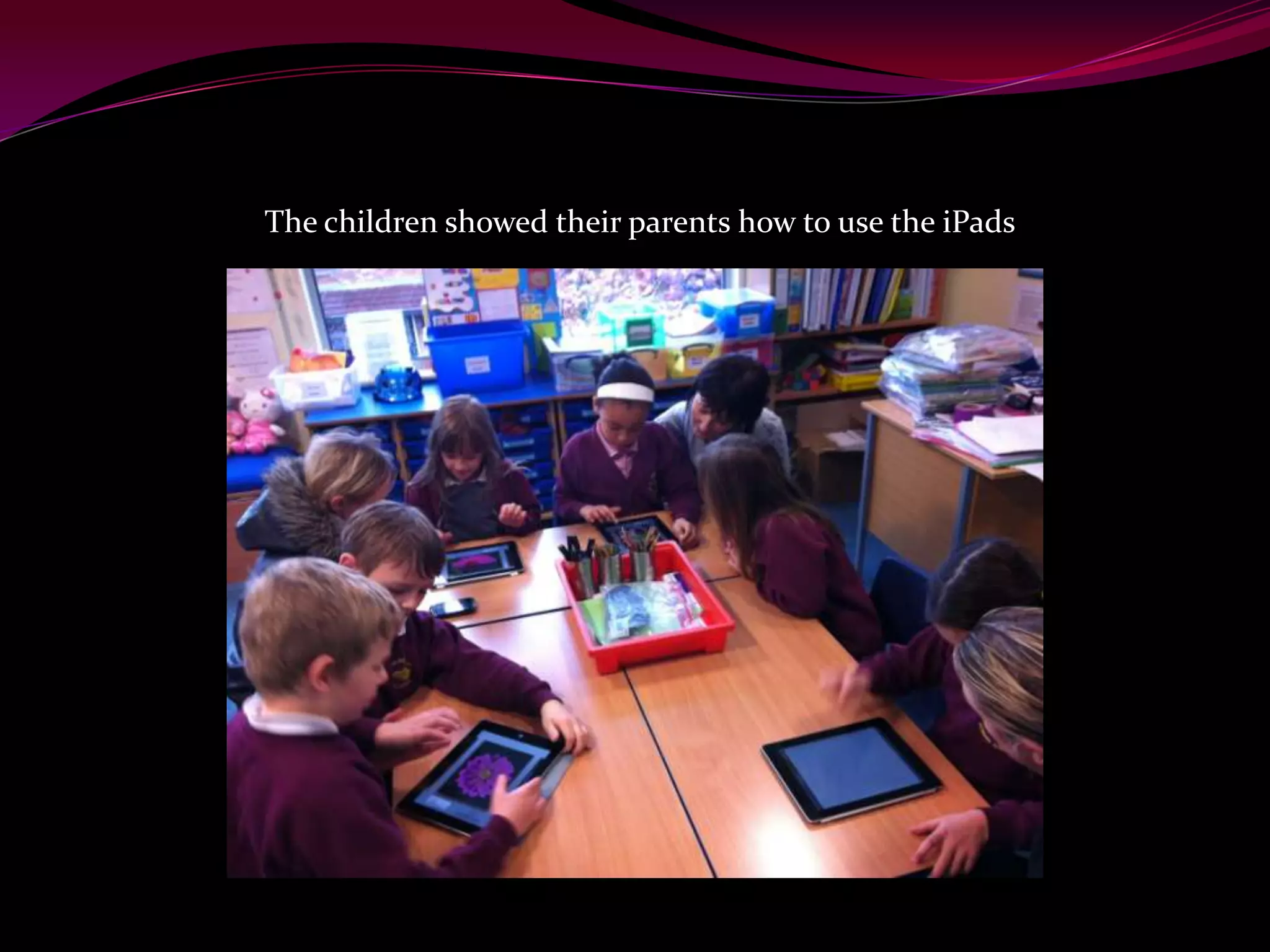 The children showed their parents how to use the iPads