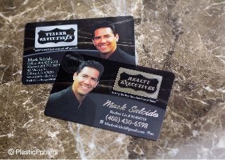 Realty Executives: Black real estate business cards with silver foil and clear accents
 