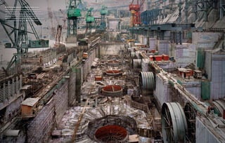  Everything about the Three Gorges Dam is
huge: Engineering feats, financial costs, social consequences and
environmental impacts all loom large. When completed in 2009, it
will be the largest hydroelectric dam ever built, nearly five times the
size of the Hoover Dam, with an electrical capacity of up to 22.5
gigawatts. It will displace more than 1 million people from their home
and will cost China about $25 billion.     Edward Burtynsky
 