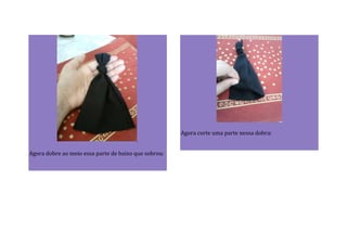Agora dobre ao meio essa parte de baixo que sobrou:
Agora corte uma parte nessa dobra:
 