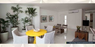 Foto do living e varanda do apartamento decorado

34                                                  35
 