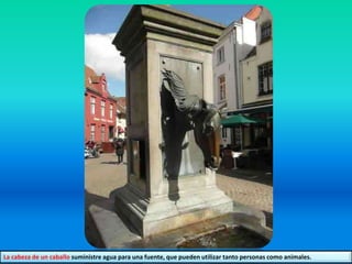 La cabeza de un caballo suministre agua para una fuente, que pueden utilizar tanto personas como animales.
 