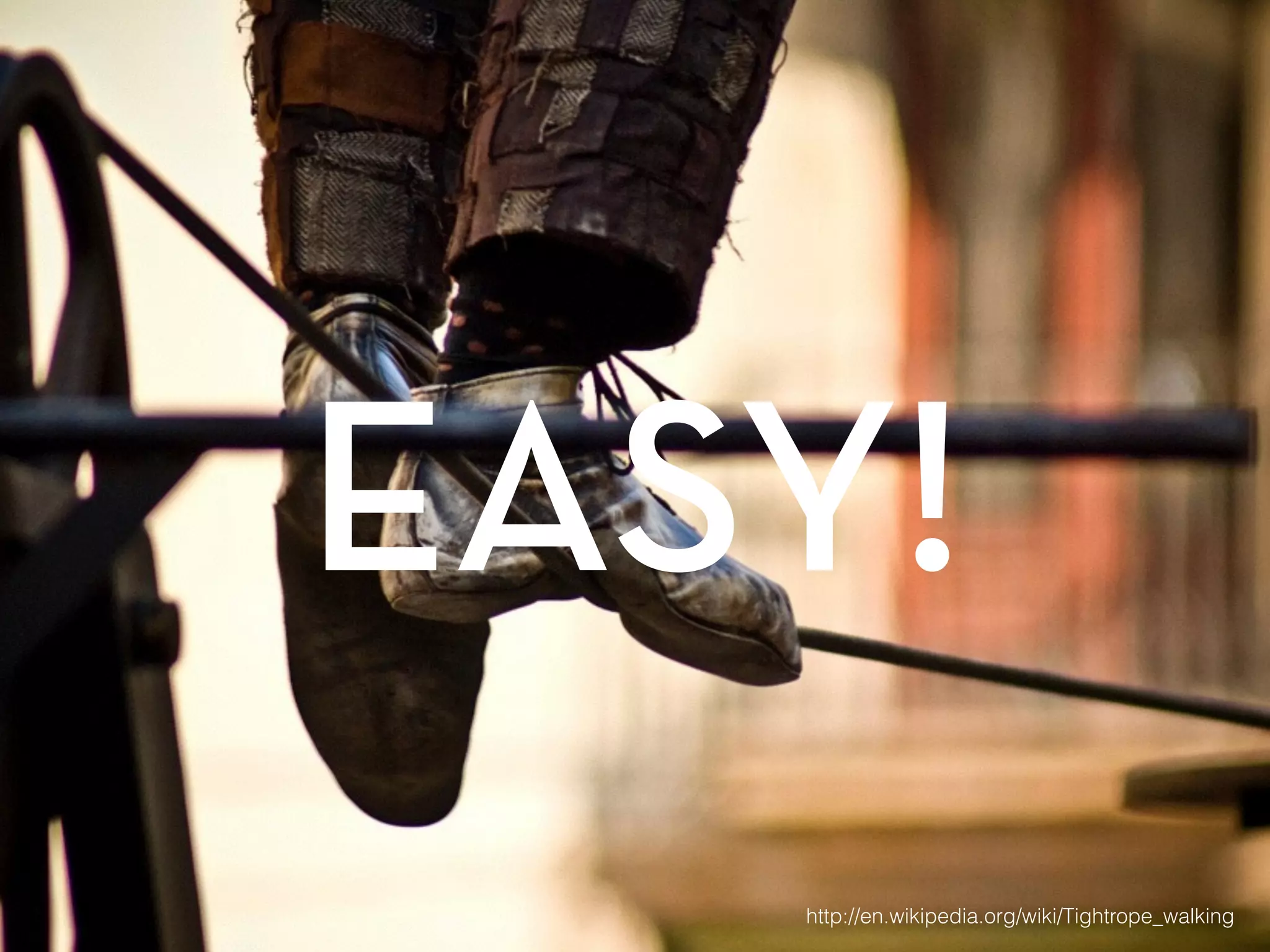 EASY! 
http://en.wikipedia.org/wiki/Tightrope_walking 
 