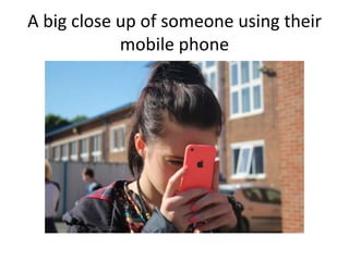A big close up of someone using their
mobile phone
 
