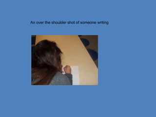 An over the shoulder shot of someone writing
 